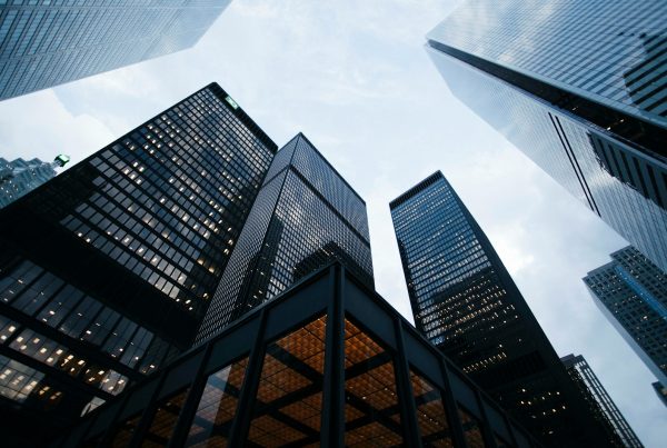 low angle photo of city high rise buildings during daytime