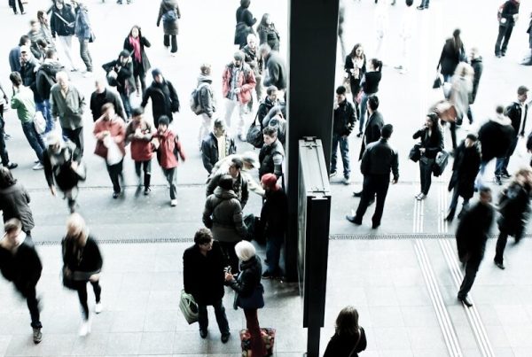 people walking on gray concrete floor