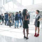 a group of people standing in a room