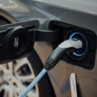 electric vehicle charging cable plugged into car
